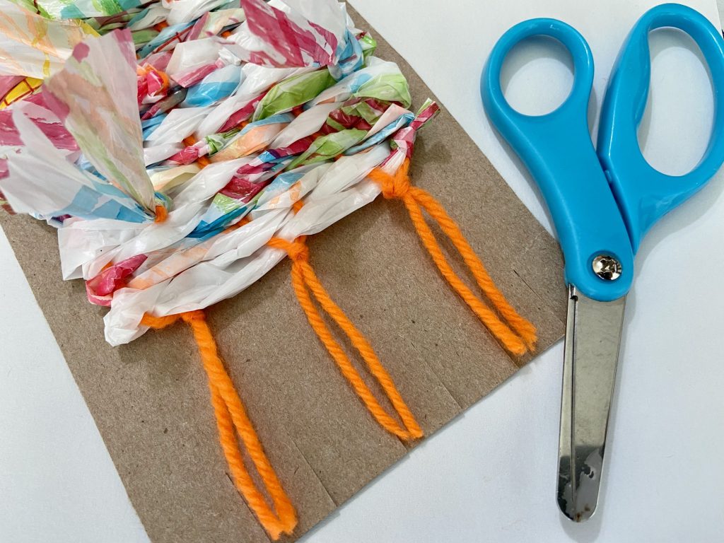 Upcycled Craft: Weaving with Plastic Bags on a Pizza Box Loom - SCARCE